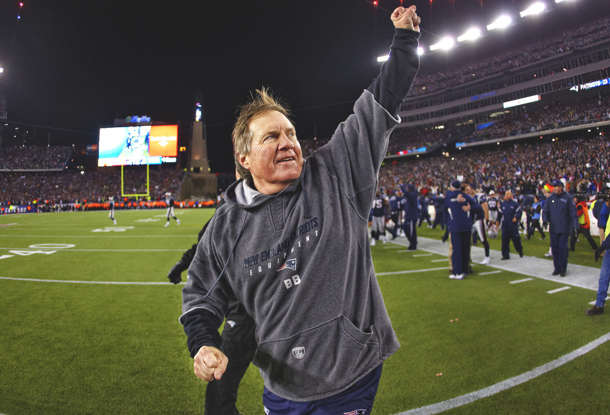 Bill Belichick runs off the Patriots’ home field in triumph.